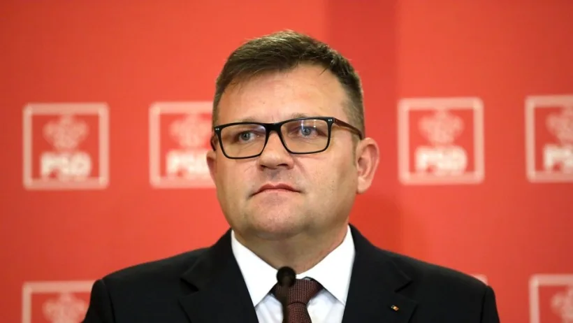 Deputatul PSD Budăi îl compară pe Bolojan cu un lăutar care cântă fals: „Când lăutarul cântă fals, toată lumea își dă seama”